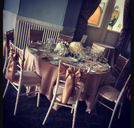 Gold Satin Bows on our Lime Wash Chiavari Chairs