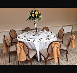 Hessian Bows on Venues New Banqueting Chairs at Headlam Hall.