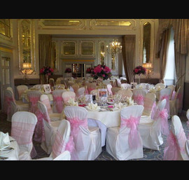 Pale Pink Organza Bows on Butter Chair Covers in Argent D'Or