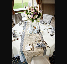 Gold Flock Table Runners set on Silver Pintuck Table Runners