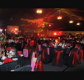 CHUF Ball in Marquee at Close House, Black Table Linen and Chair Covers, Red Organza Tie