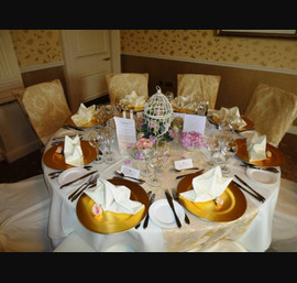 Close House Hotel. Gold Charger Plates, on Butter Table Linen, with Vintage Flock Table Runner and Vintage Chair Veils