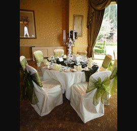Olive Green Organza Sash on Butter Chair Covers at Close House Hotel