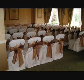 Chocolate and Gold Organza Double Bows with Autumn Floral Accessory on Butter Chair Covers