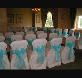 Close House Hotel - Turquoise Bow with Butter Chair Covers