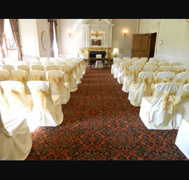 Antique gold sashes on butter linen in Civil Ceremony at Crathorne Hall