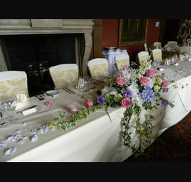 Crathorne Hall top table with flowers by Valerie Rose