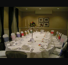 Durham Marriott Hotel, White Chair Covers and Multi Coloured Sashes