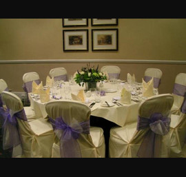 Durham Marriott Royal County - Butter Chair Covers with Purple and Ivory Double Bow