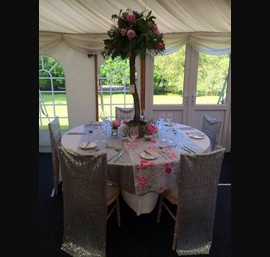 Silver Sequin Veils made to measure Chiavari Chairs with matching Table Runner with Floral Overlay