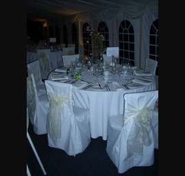 Made to Measure Chair Covers as an option on Chiavari Chairs with Ivory Organza Bows