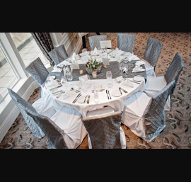 Silver Pintuck Chair Backs on White Chair Covers at Rockliffe Hall