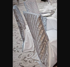 Silver Pintuck Chair Backs on White Chair Covers at Rockliffe Hall
