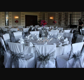 Summer Ball - Grassholme Suite Rockliffe Hall Hotel. White Chair Covers with Silver Organza Bows