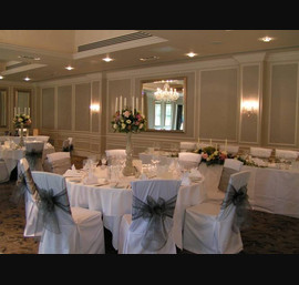 Silver Organza Bows on White Chair Covers, Rockliffe Suite, Rockliffe Hall Hotel