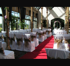 Bronze Organza Sashes, with White Made to Measure Chair Covers. The Orangery, Rockliffe Hall Hotel, Darlington