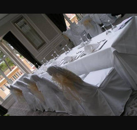 Rockliffe Hall Wedding - White Chair Covers with Champagne Organza Bow