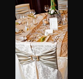 Jacquard Chair Covers with Gold Diamante Bands on Butter Linen with a Gold Pintuck Runner topped with Gold Flock at Rockliffe Hall