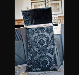 Black Flock Chair Backs on Black Chair Covers with Black and Gold Luxury Chair Cap at Rockliffe Hall