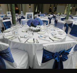 Blue Sapphire Satin and Navy Organza sashes with White Chair Covers
