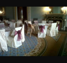 Ivory chair covers and wine and jacquard