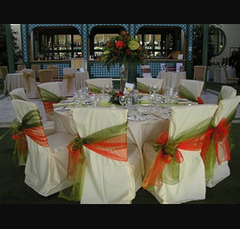 Wynyard Hall - Ivory Chair Covers with Burnt Orange and Green Side Sash