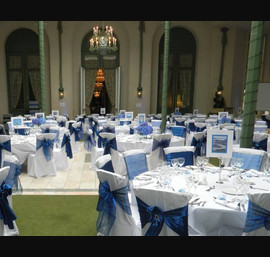 Navy Organza and Sapphire Blue Satin Sashes on White Chair Covers, in the Conservatory