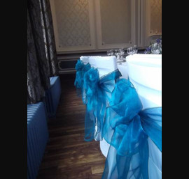 Teal Organza Sashes on White Chair Covers