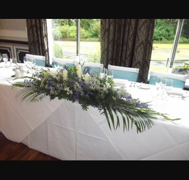 Teal Organza Sashes on White Chair Covers
