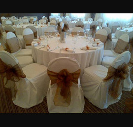 Bronze Organza Sashes on White Chair Covers at The Brinsop, Westhoghton