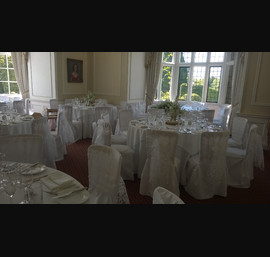 White chaircovers with white flocked organza sashes at Goldsborough Hall