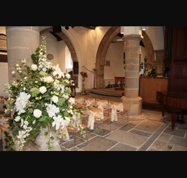 Champagne flocked organza sashes at All Saints Church, Kirkby Overblow
