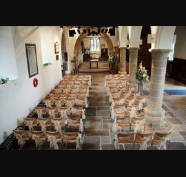 Champagne flocked organza sashes at All saints Church, Kirkby Overblow