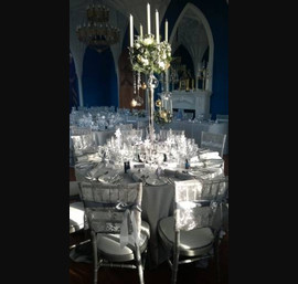 Silver lace chair hood on silver Chiavari chairs at Allerton castle