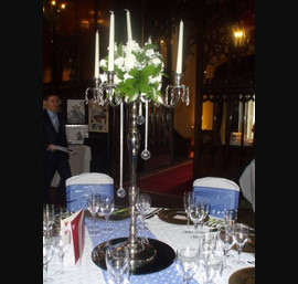 Electic Blue Sashes on white chair covers. Eectric Blue tabel runner with lace overlay at Allerton Castle
