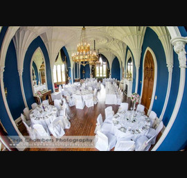 Champagne organza side sashes on White Chair Covers at Allerton Castle