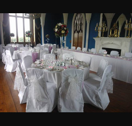 White flocked organza sashes on White Chair Covers at Allerton Castle
