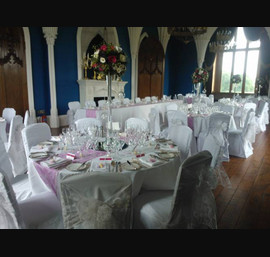 White flocked organza sashes on White Chair Covers at Allerton Castle