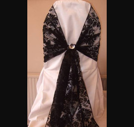 Black flock sash, with diamante centre peice
