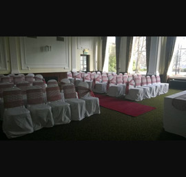 Claret Organza sashes with lace overlays on white chair covers at Cedar Court Hotel
