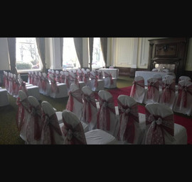 Claret Organza sashes with lace overlays on white chair covers at Cedar Court Hotel