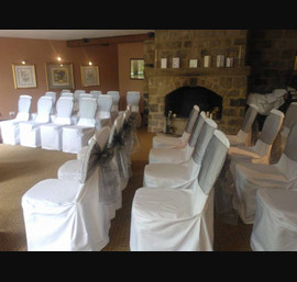 Silver organza sashes on White Chair Covers at Chevin Lodge