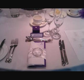 White Satin napkin ring with diamante buckle at the Chevin Lodge Hotel