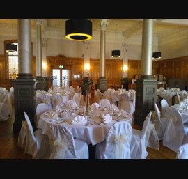 Champagne Organza Sashes on white chair covers at the Crown Hotel Harrogate