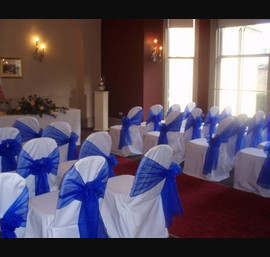 Electric Blue organza sashes on white chair covers atThe Crown Hotel, Harrogate