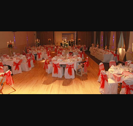 Red Organza sashes with lace inserts on White Chair Covers at the Crown Hotel Harrogate
