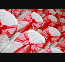 Red Organza sashes with lace inserts on White Chair Covers at the Crown Hotel Harrogate