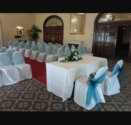 Peacock Organza Sashes on white chair covers at the Crown Hotel Harrogate
