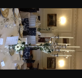 White chaircovers with black organza flocked viels at Goldsborough Hall