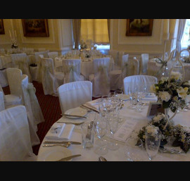 Mint green sashes on White Chair Covers at Goldsborough Hall